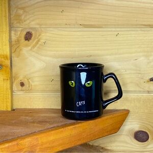 Black Cat Mug by [Brand]